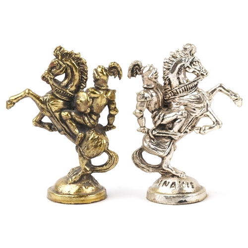 1038 - A Forma cast metal chess set, the king 8.5cm high, together with an onyx and alabaster chequer board... 