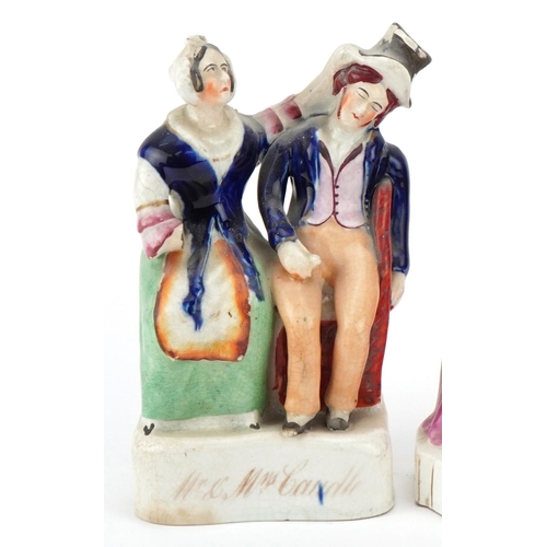 201 - Two Victorian Staffordshire pottery figure groups of Mr. & Mrs. Candle together with a seated female... 