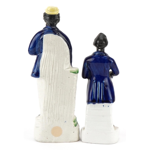 200 - A Victorian Staffordshire pottery figure of Sir Robert Peel together with a flatback figure of a gen... 