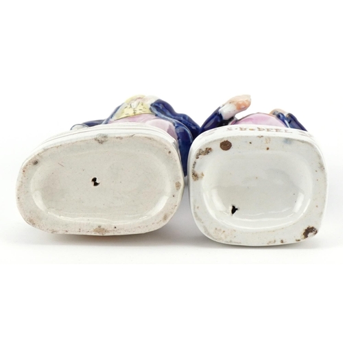 200 - A Victorian Staffordshire pottery figure of Sir Robert Peel together with a flatback figure of a gen... 