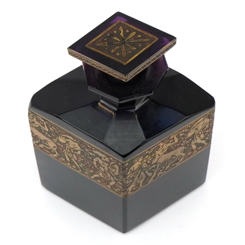 157A - A Moser Bohemian amethyst glass perfume bottle with gilded surround frieze, stamped Karlovey Vary to... 