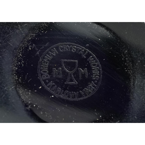 157A - A Moser Bohemian amethyst glass perfume bottle with gilded surround frieze, stamped Karlovey Vary to... 