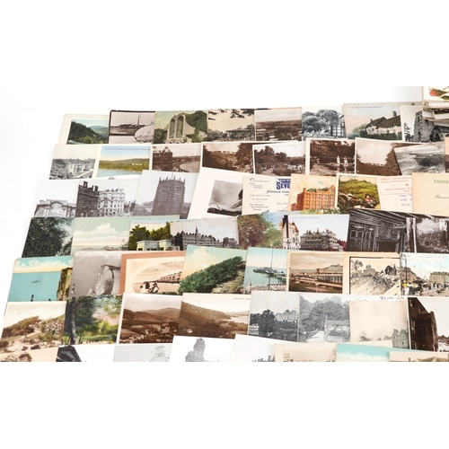 A collection of early 20th century and later postcards, some ...