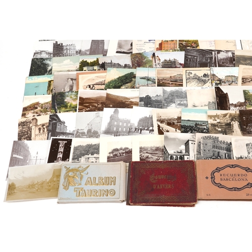 A collection of early 20th century and later postcards, some ...
