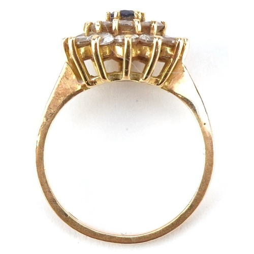 3031 - An 18ct gold sapphire and clear stone three tier cluster ring, size M, 4.4g.