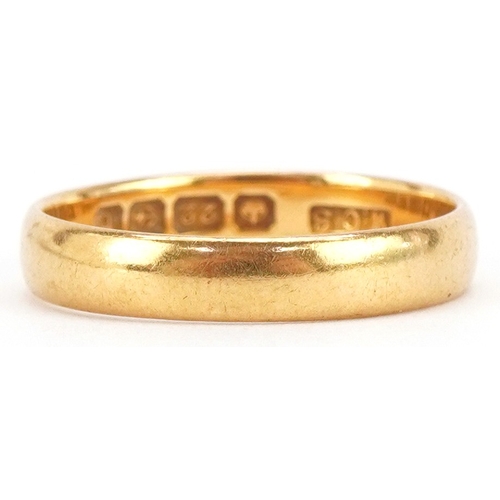 3028 - A 22ct gold wedding band, Birmingham 1918, size R, 4.3g.
