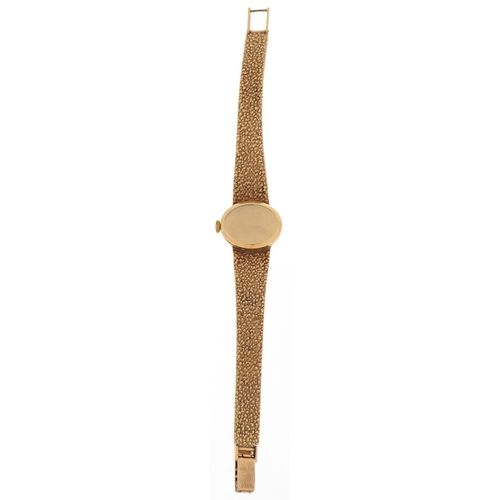 3035 - Tissot, a ladies 9ct gold Tissot manual wind wristwatch with 9ct gold strap, the case 21mm wide, tot... 