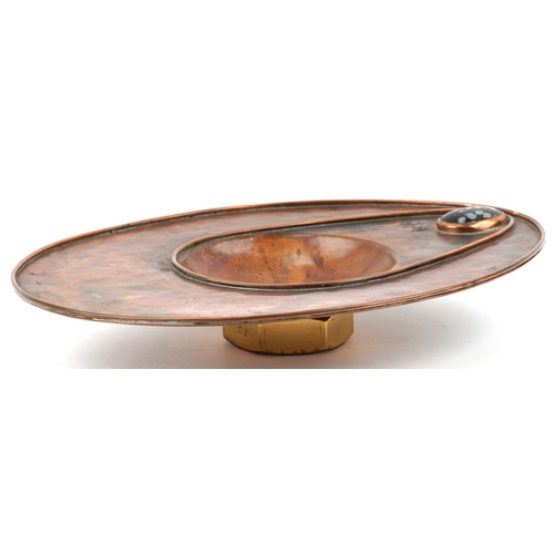 5 - Sam Fanaroff, an Arts & Crafts style abstract copper and brass centre bowl set with a black cabochon... 