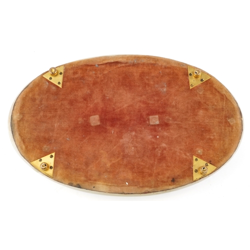 10 - An early 20th century onyx and gilt metal mounted desk stand fitted with two cut glass inkwells, eac... 