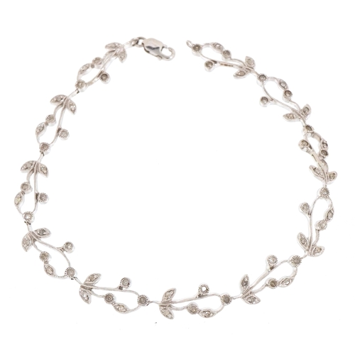 3032 - An unmarked white gold and diamond floral bracelet, 19cm in length, 6.0g.