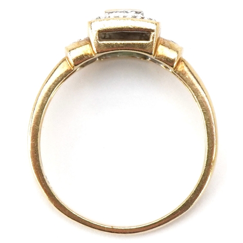 3033 - An Art Deco style 9ct gold emerald ring with diamond set stepped shoulders, size R, 3.5g.