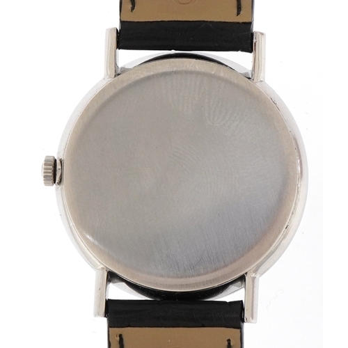 3004 - Omega, a stainless steel gentlemen's manual wind wristwatch, the movement numbered 21986427, 34mm in... 