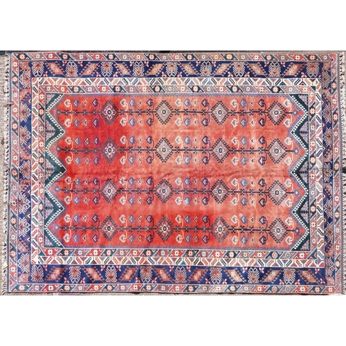 A Turkish Döşemealtı carpet, South Turkey, 20th century, hand woven wool, made by semi-nomadic people, 392cm x 293cm.