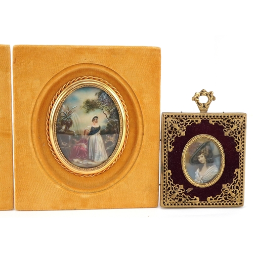31 - A pair of 20th century oval hand painted porcelain panels, each decorated with two young women, each... 