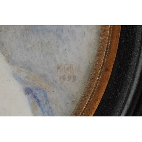 31 - A pair of 20th century oval hand painted porcelain panels, each decorated with two young women, each... 