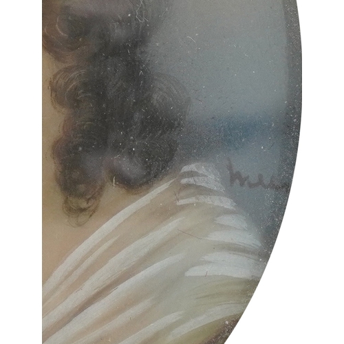 31 - A pair of 20th century oval hand painted porcelain panels, each decorated with two young women, each... 