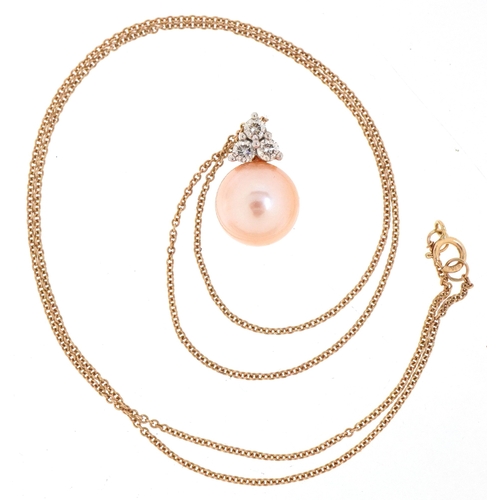 3011 - A 9ct gold cultured pearl and diamond pendant on a 9ct gold necklace, total diamond weight approxima... 