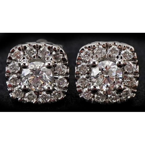 3046 - A pair of 14ct white gold diamond cluster stud earrings, total diamond weight approximately 1.00 car... 