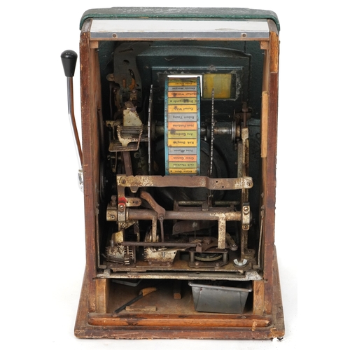 138 - A mid 20th century American 'Stars of the Silver Screen' One Armed Bandit amusement arcade game, 62c... 