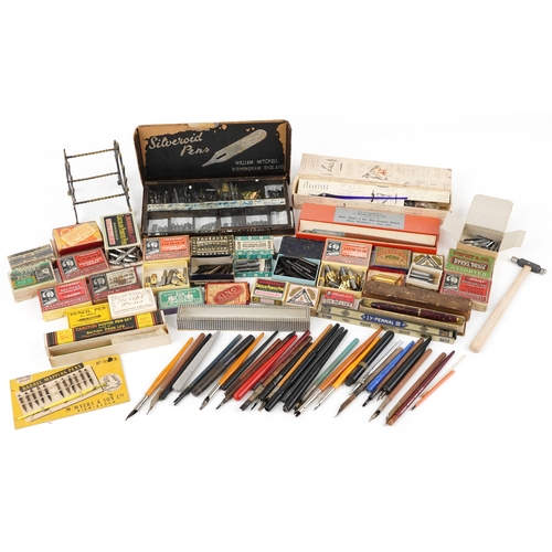 434 - A collection of early 20th century dip pen nibs including examples by William Mitchell, John Heath, ... 