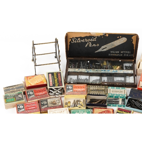 434 - A collection of early 20th century dip pen nibs including examples by William Mitchell, John Heath, ... 