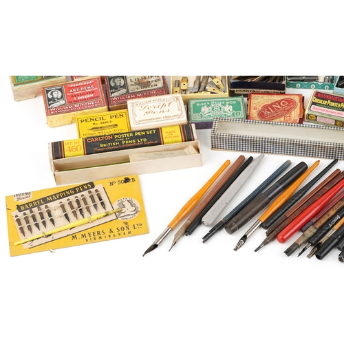 434 - A collection of early 20th century dip pen nibs including examples by William Mitchell, John Heath, ... 