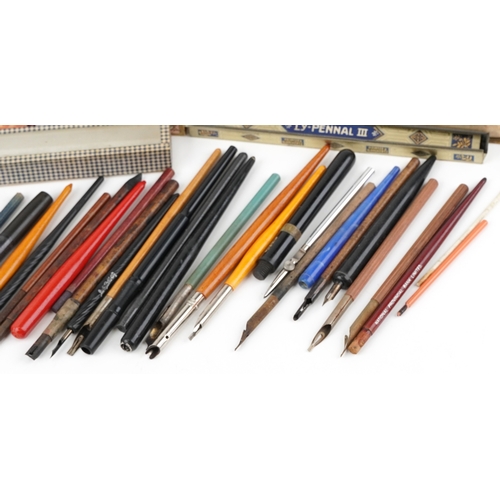 434 - A collection of early 20th century dip pen nibs including examples by William Mitchell, John Heath, ... 