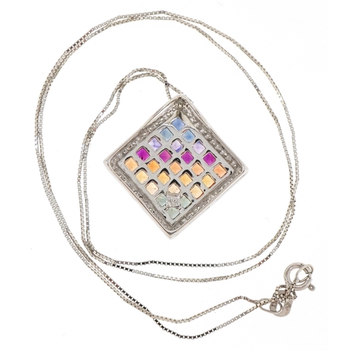 3024 - A 9ct white gold diamond and coloured sapphire pendant on a 9ct white gold chain, 2.2cm high and 46c... 