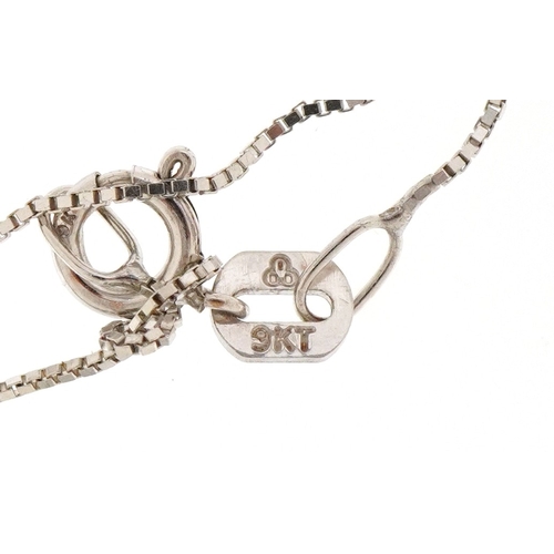 3024 - A 9ct white gold diamond and coloured sapphire pendant on a 9ct white gold chain, 2.2cm high and 46c... 
