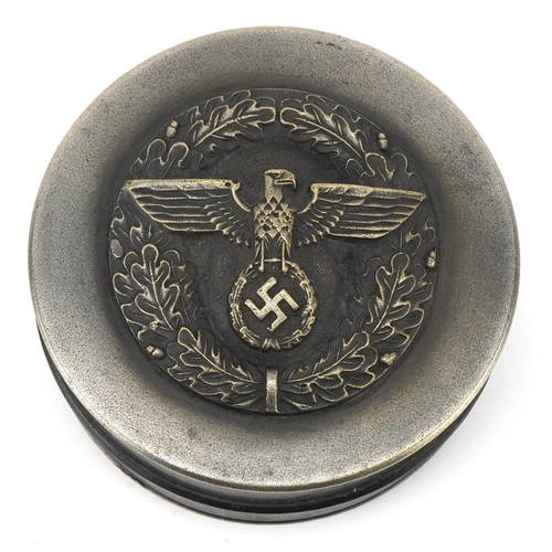 A German military interest snuff box, 7cm in diameter.