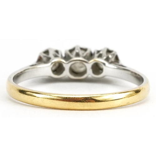 3054 - 18ct gold and platinum diamond three stone ring, the centre diamond approximately 3.7mm in diameter,... 