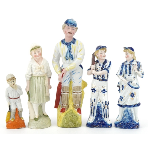 2498 - Various Victorian bisque figures of cricketers including a boy and girl couple, the largest 24cm hig... 