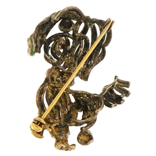 3016 - An enamelled gilt metal brooch in the form of a dog, 4.0cm high, 10.2g.