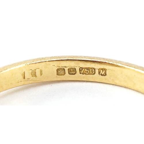 3031A - An 18ct gold diamond three stone ring, total diamond weight approximately 0.70 carat, size L, 2.8g.