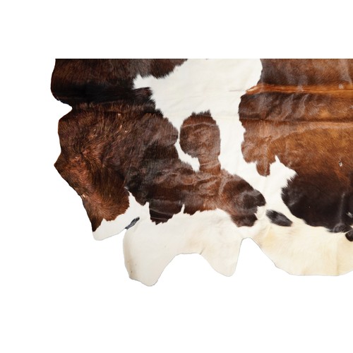 2501 - A large cow hide, 177cm in length.