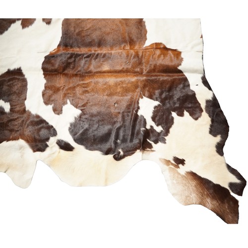 2501 - A large cow hide, 177cm in length.