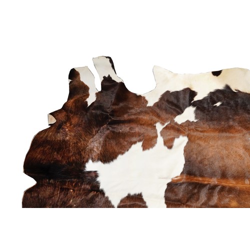 2501 - A large cow hide, 177cm in length.