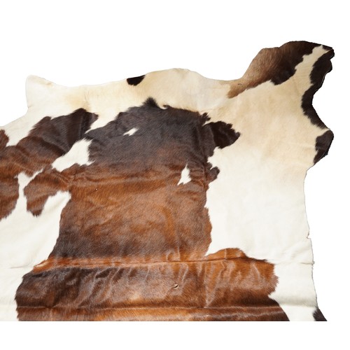 2501 - A large cow hide, 177cm in length.