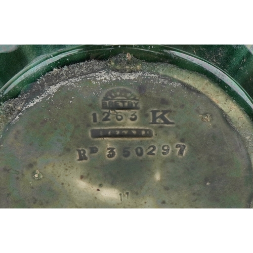 109 - An Art Nouveau Bretby pottery jardinière impressed marks to the base, 24cm high.