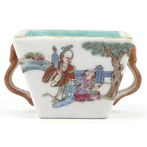41 - A Chinese porcelain square section bowl with twin handles finely hand painted with enamels in the fa... 