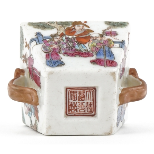 41 - A Chinese porcelain square section bowl with twin handles finely hand painted with enamels in the fa... 