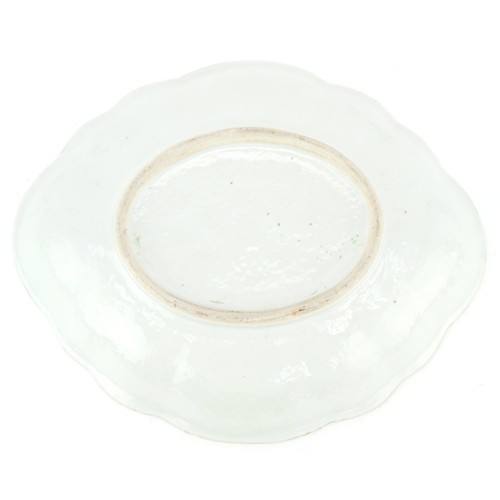 40 - A Chinese porcelain dish finely hand painted with enamels in the famille rose palette with an empero... 