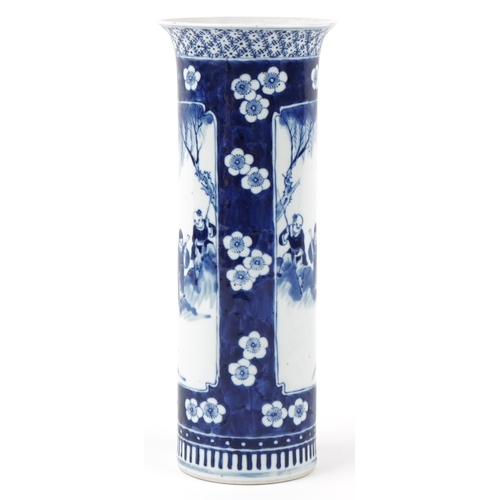 33 - A Chinese blue and white porcelain cylindrical vase, decorated with two panels of farmers, bearing f... 