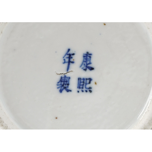 33 - A Chinese blue and white porcelain cylindrical vase, decorated with two panels of farmers, bearing f... 