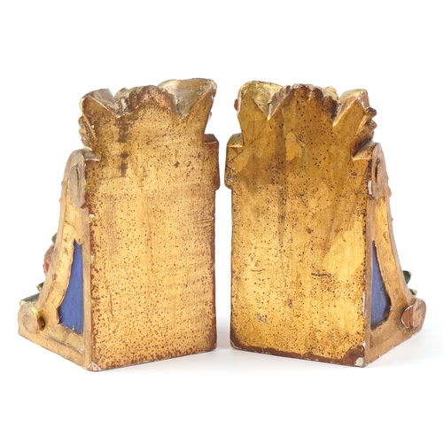 23 - A pair of late 19th century giltwood and gesso polychrome painted wall brackets with gilded decorati... 