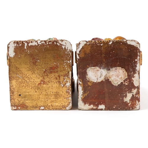 23 - A pair of late 19th century giltwood and gesso polychrome painted wall brackets with gilded decorati... 