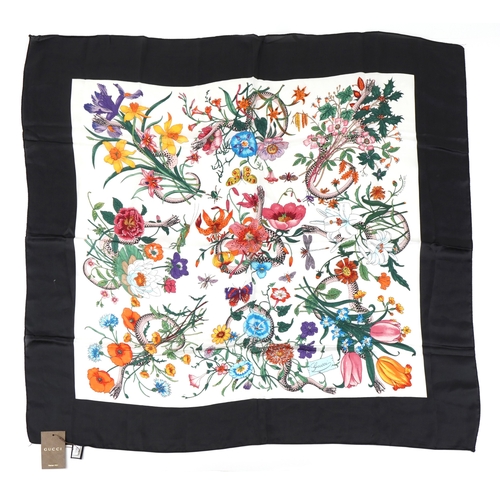 561 - Gucci, an Italian silk scarf in the Flora print designed by Vittorio Accornero, 88cm x 88cm.