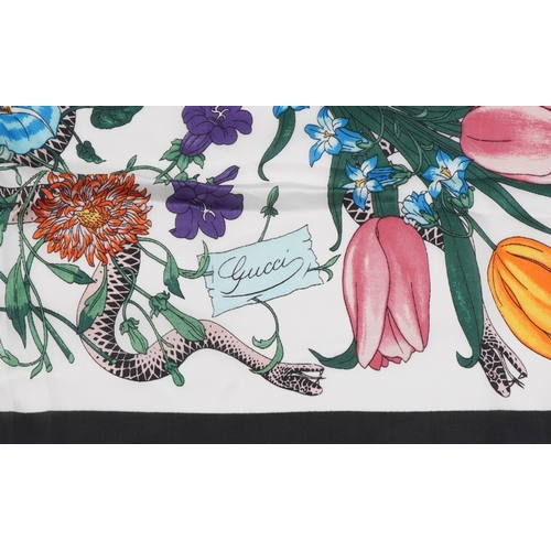 561 - Gucci, an Italian silk scarf in the Flora print designed by Vittorio Accornero, 88cm x 88cm.