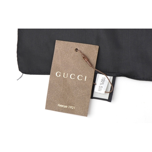 561 - Gucci, an Italian silk scarf in the Flora print designed by Vittorio Accornero, 88cm x 88cm.