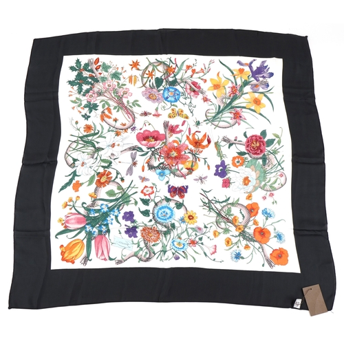 561 - Gucci, an Italian silk scarf in the Flora print designed by Vittorio Accornero, 88cm x 88cm.